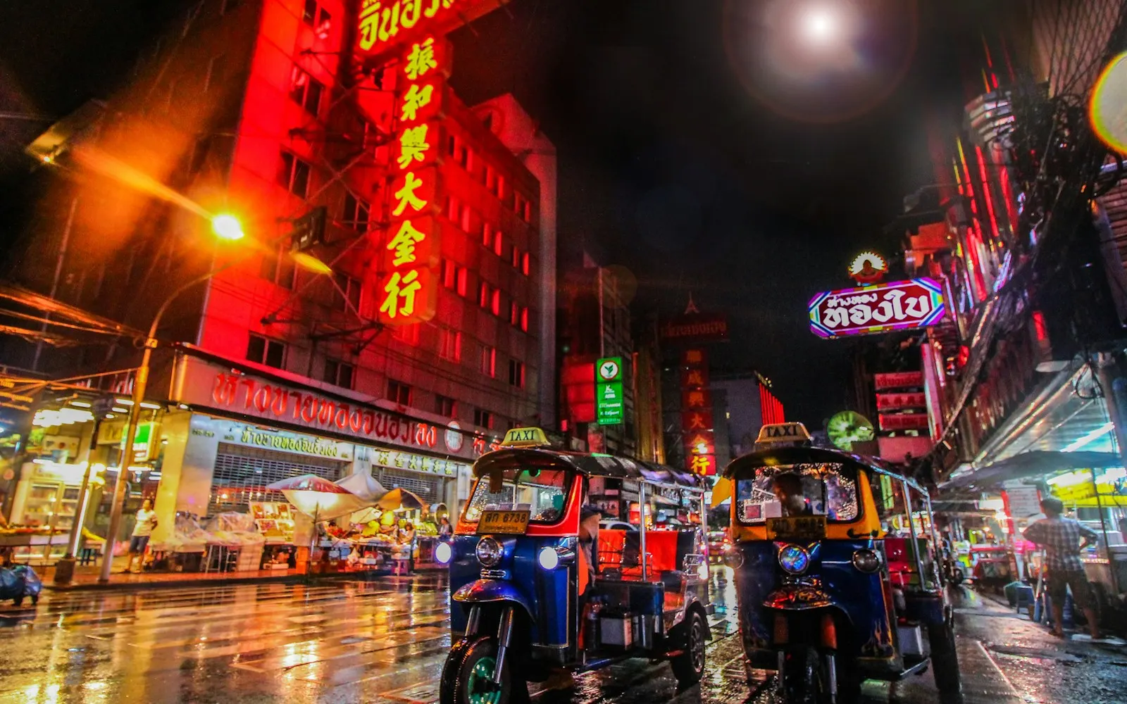 Colorful tuk-tuks on a Bangkok street
